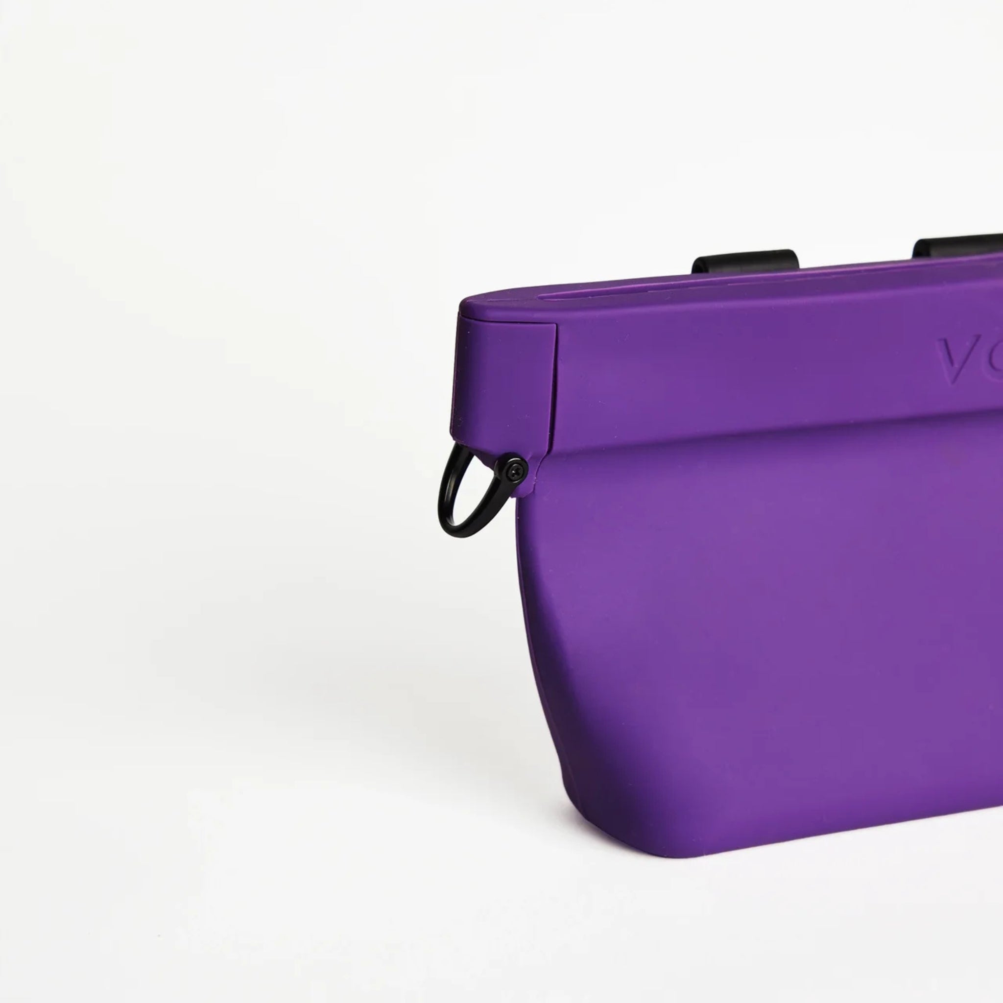 Close-up of the attachment D-ring on the VoilaPets Ultimate Treat Pouch in Aubergine