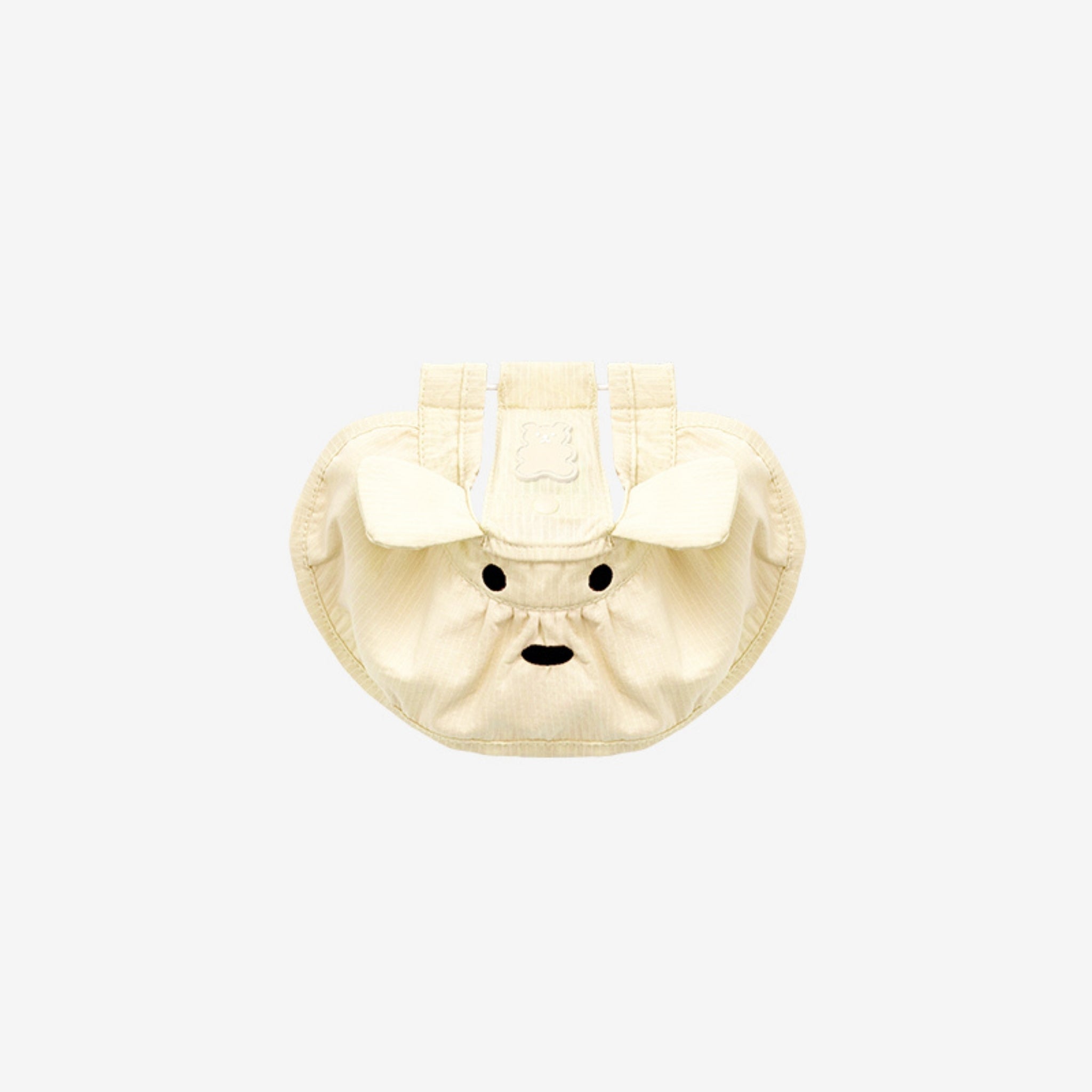 A top-down flatlay view of the light lemonade yellow Big Bear Cooling Dog Sun Hat by Puppy Gallery, showcasing the ear cutouts, attached fabric bear ears, an embroidered bear patch, and an adjustable toggle chin strap on a plain background.