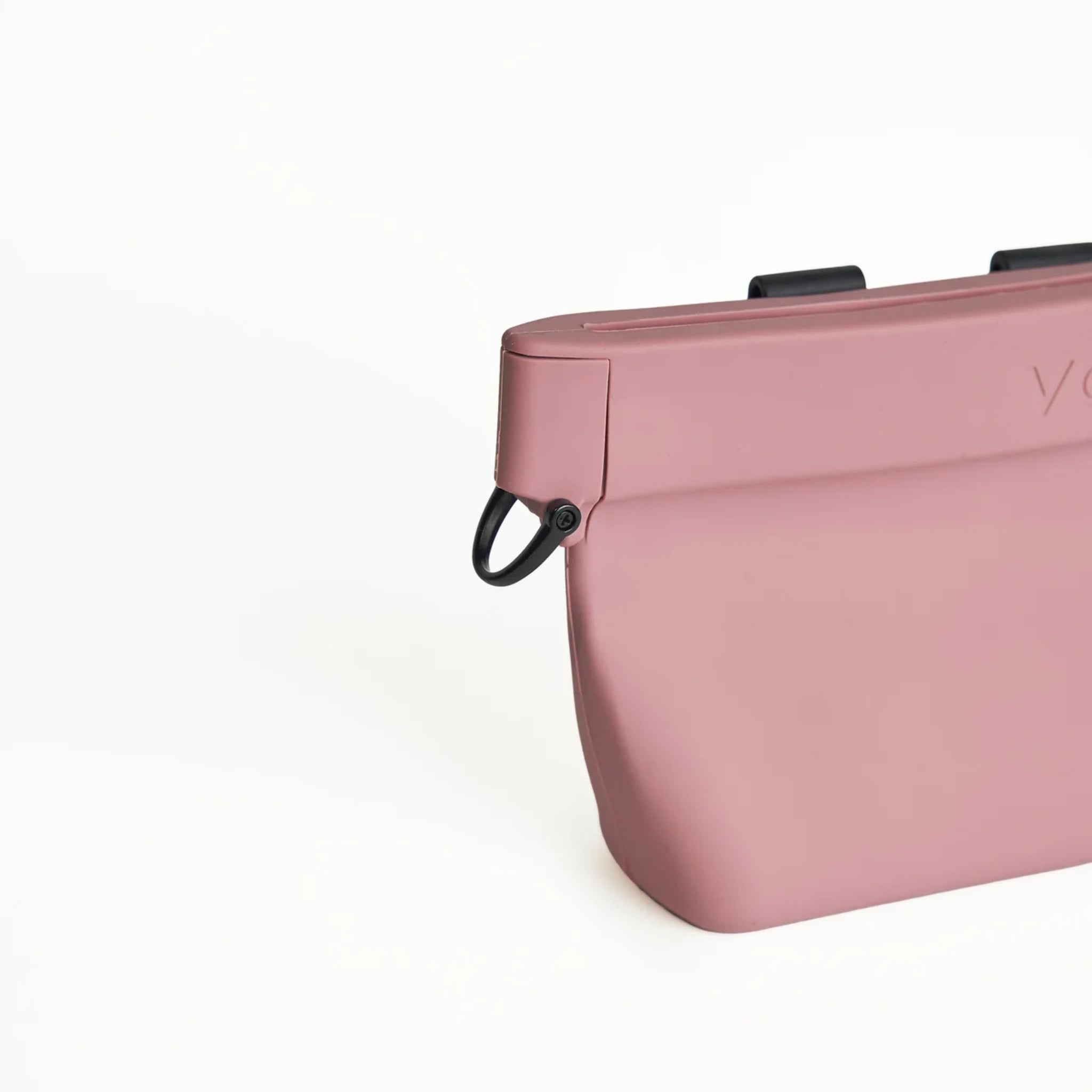 Close-up of the attachment D-ring on the VoilaPets Ultimate Treat Pouch in Dusty Rose