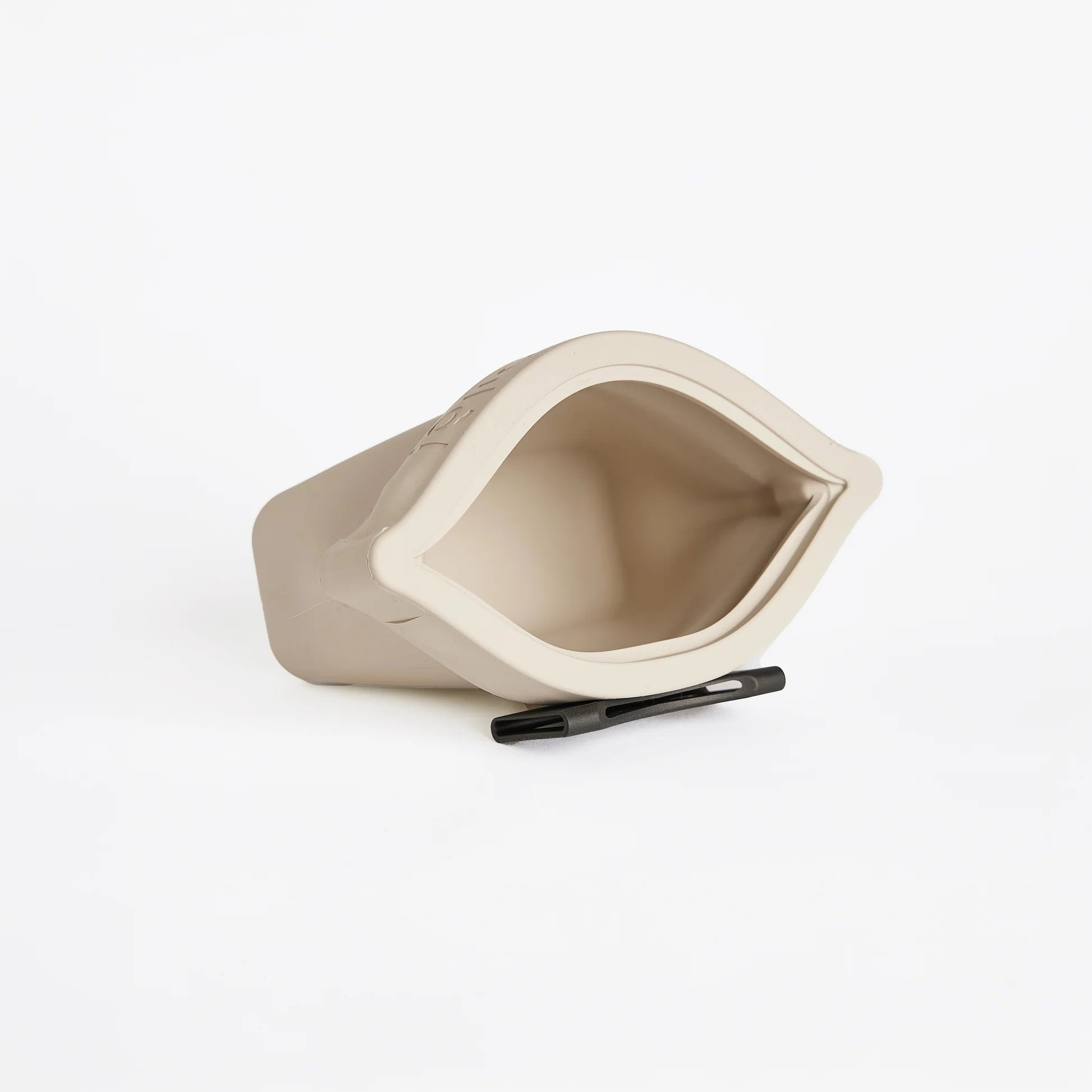 Open Voila Pets silicone treat pouch in stone showing wide mouth and flexible design