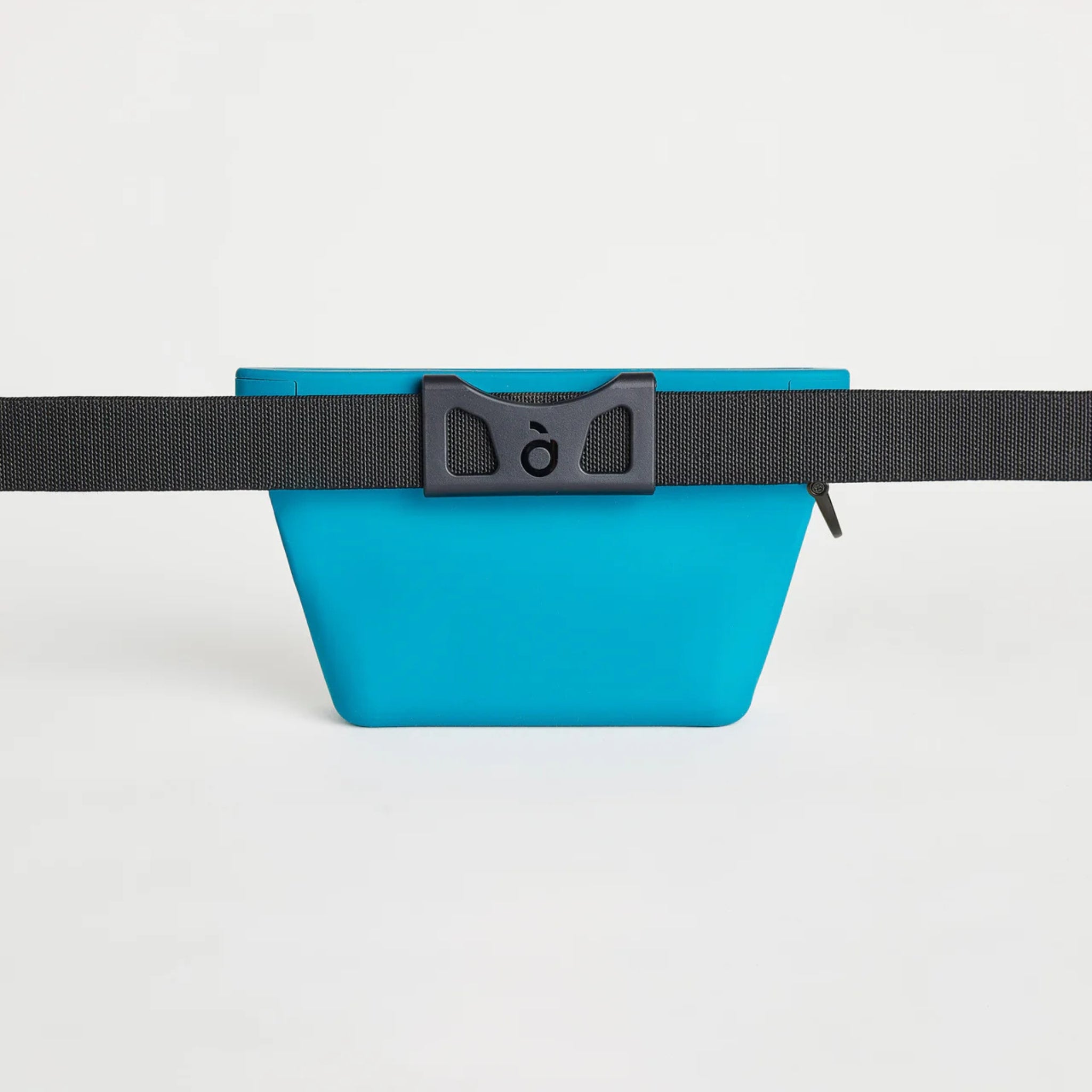 The back view of the turquoise Voilapets Ultimate Treat Pouch The Mini, attached to an adjustable black nylon dog training belt clip.
